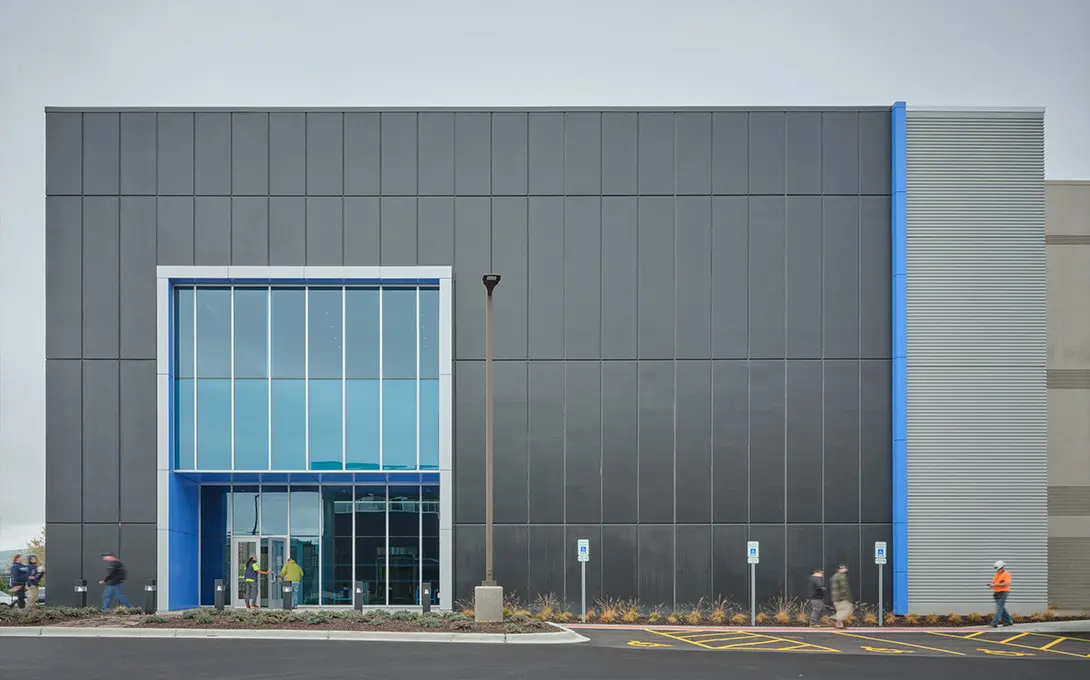 data center exterior shot of grey building with entrance