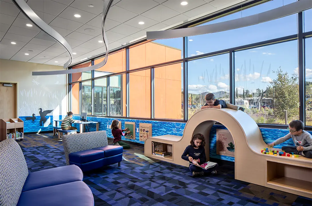 Children reading inside library