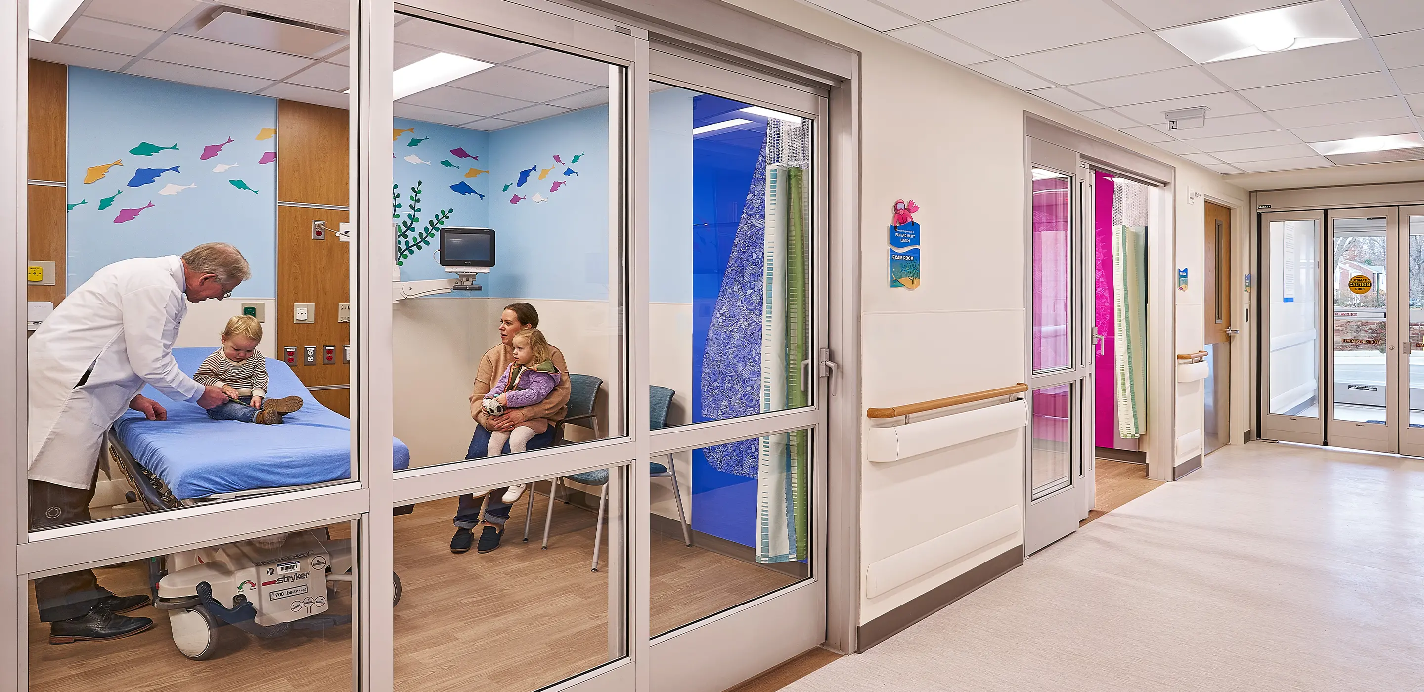 interior of pediatric ER with doctor and patient