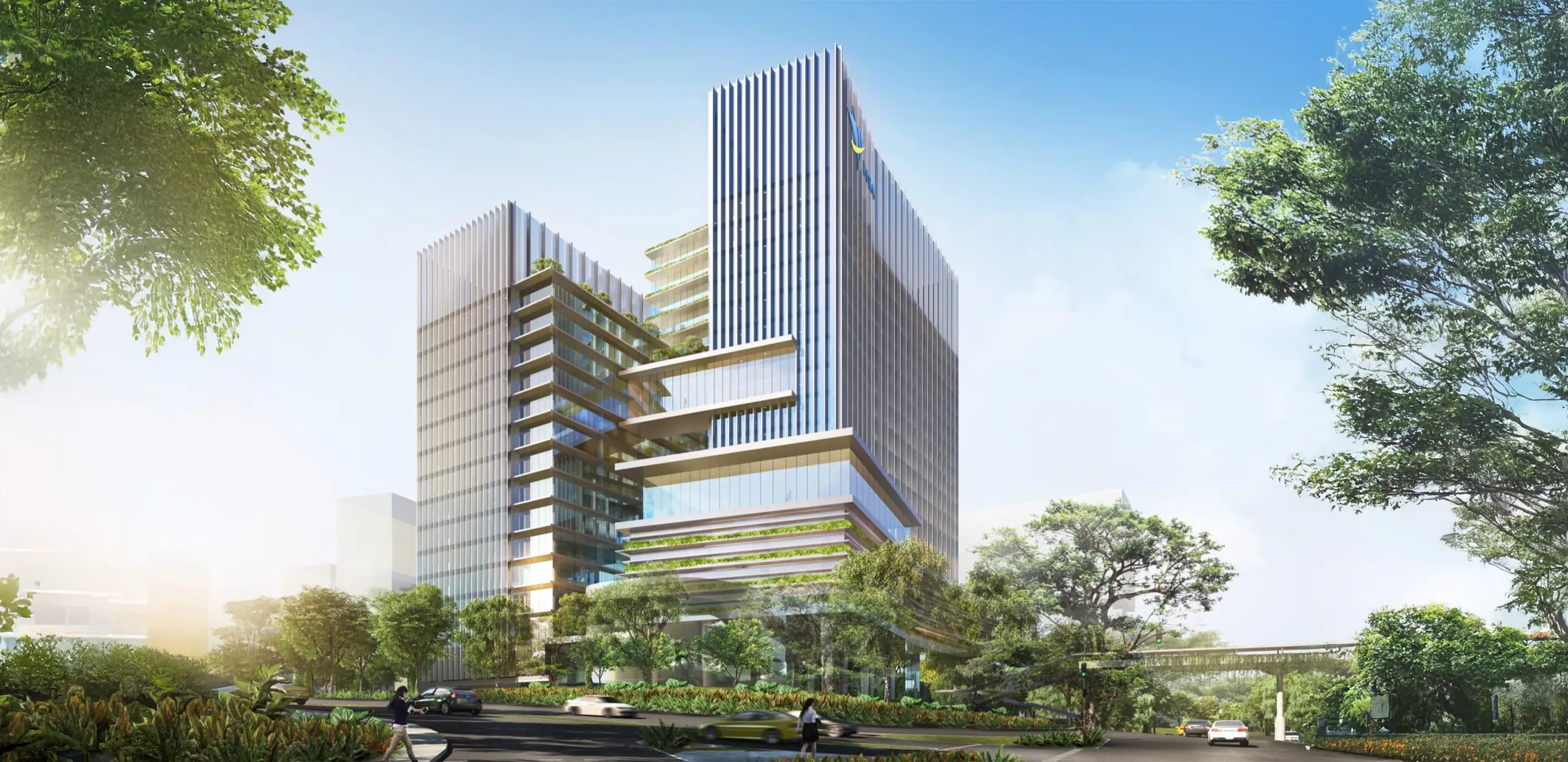 Modern skyscrapers with glass facades surrounded by greenery on a sunny day.