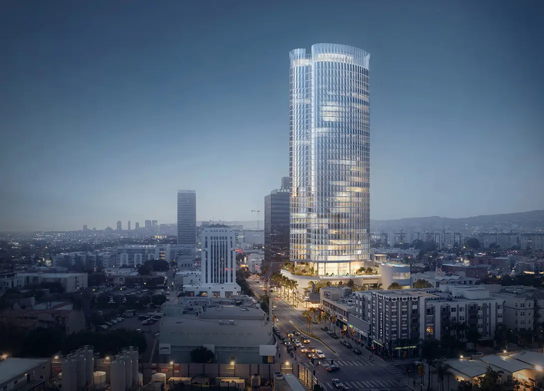 Lit skyscraper at dusk in cityscape, modern architecture, vibrant urban skyline.
