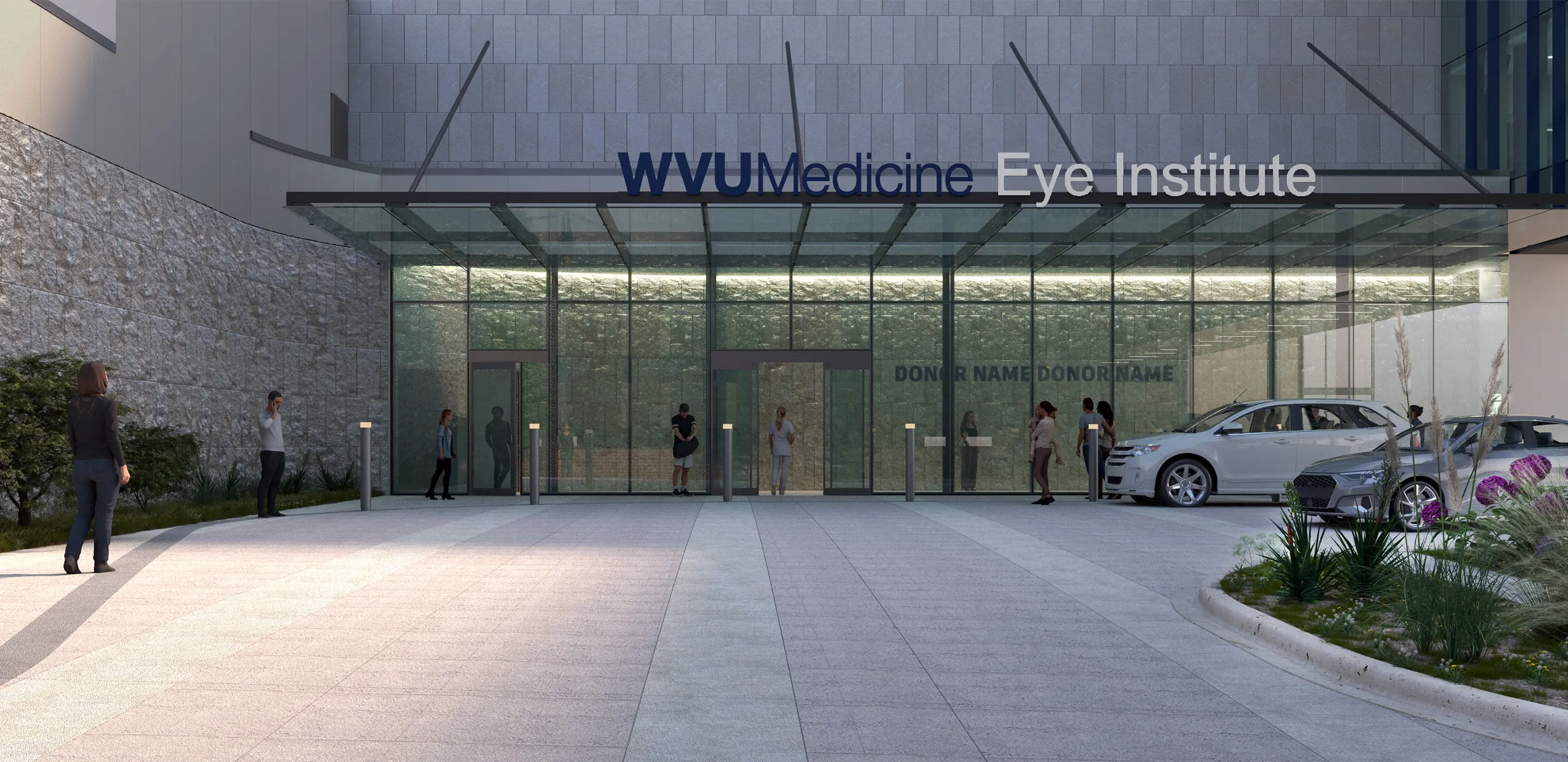 Entrance of WVU Medicine Eye Institute with glass doors, parked cars, and people walking.
