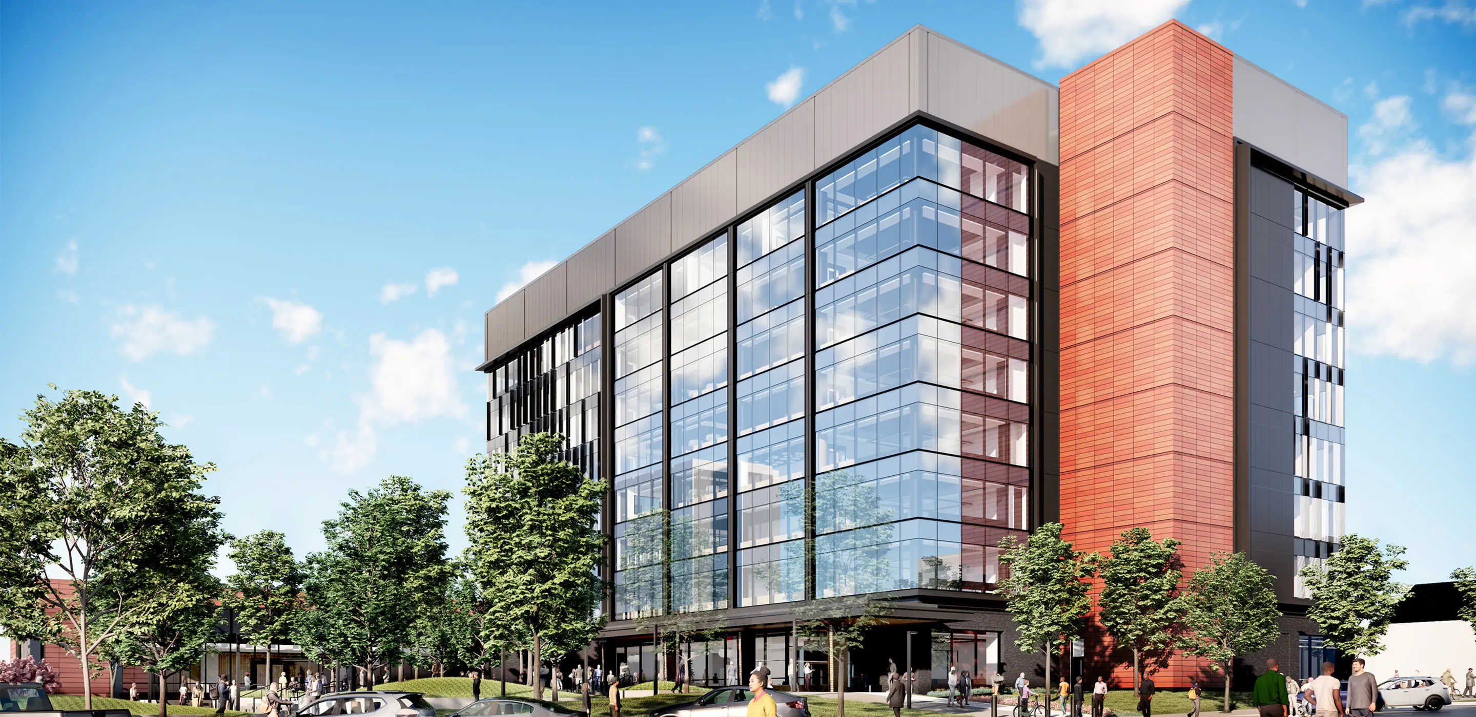 Modern office building with glass facade surrounded by trees and pedestrians on a sunny day.