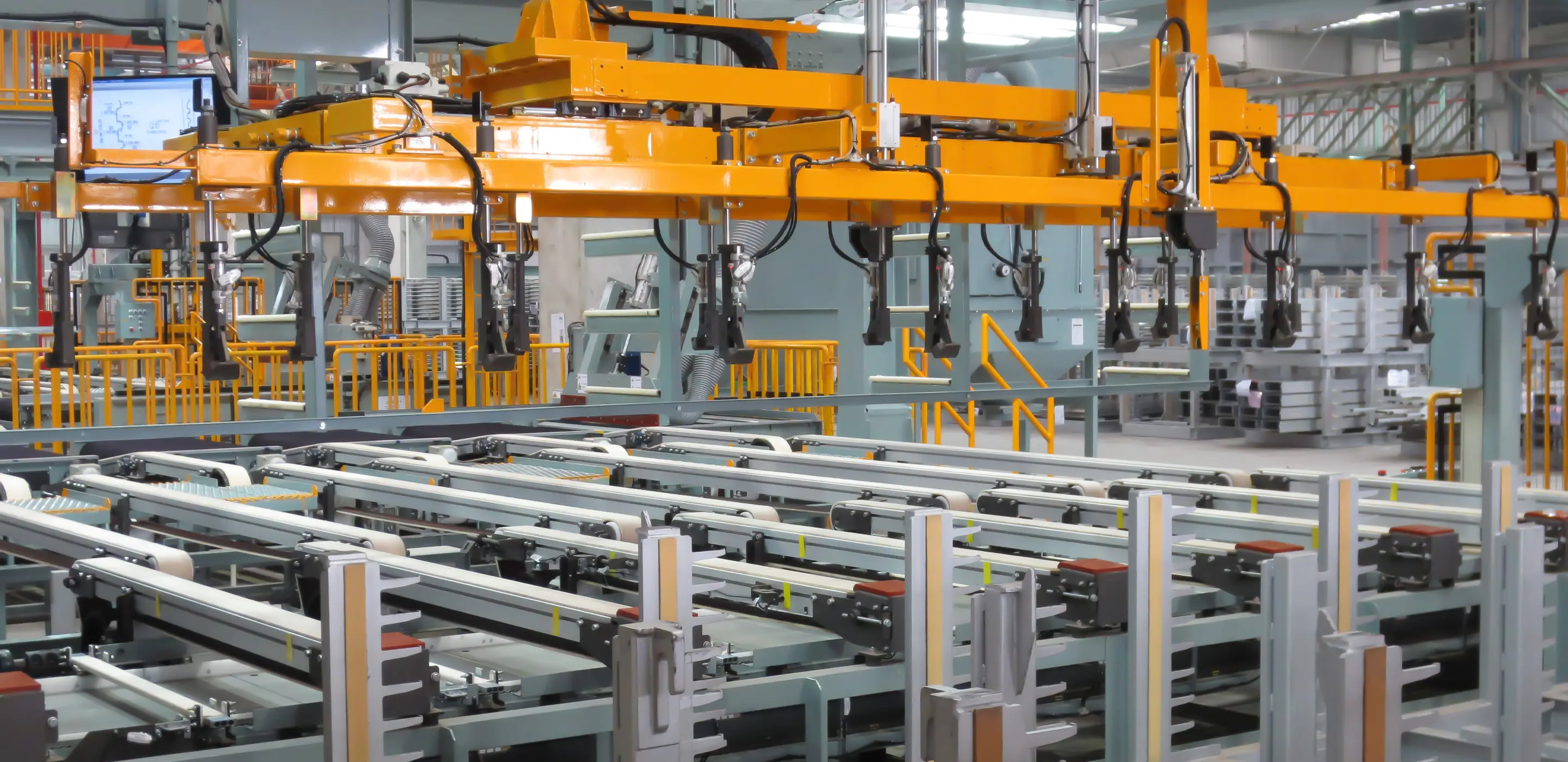 Modern automation machinery in a factory setting, featuring advanced robotic equipment.