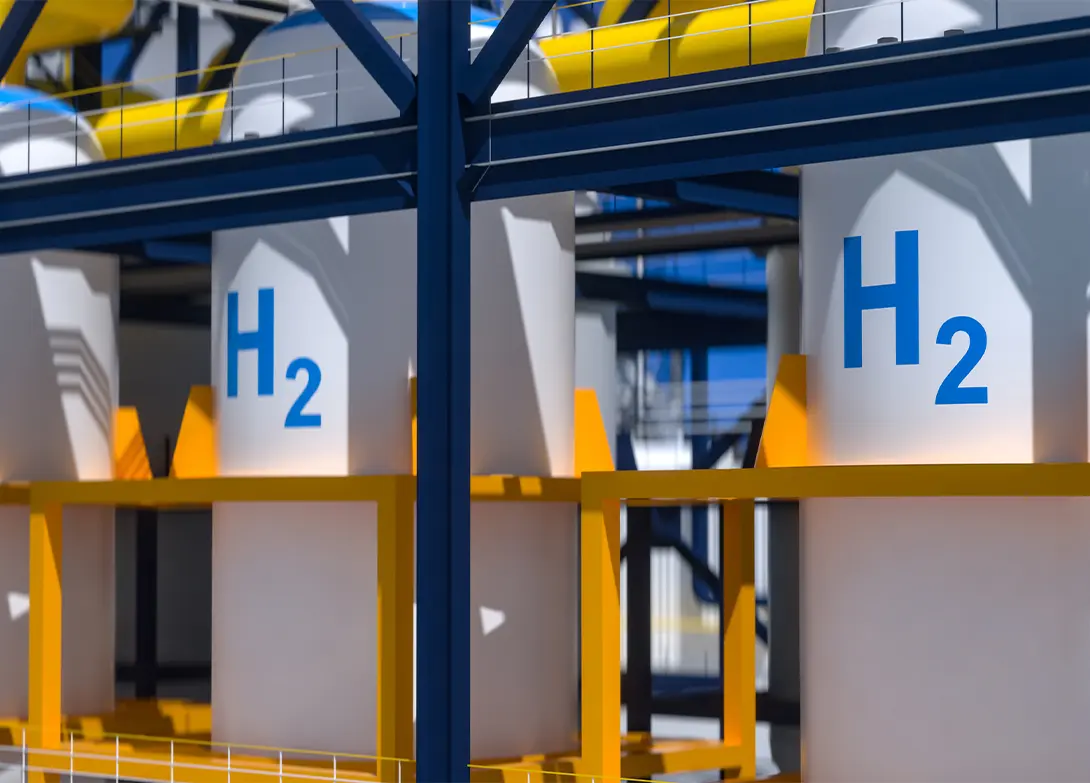 Hydrogen storage tanks at an industrial facility with H2 labels and structural supports.