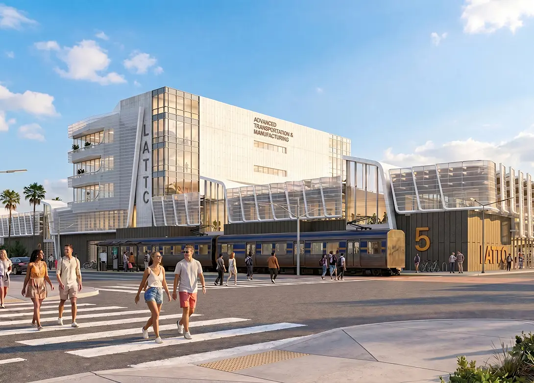 Modern transportation hub with train and pedestrians at LATTC campus under sunny skies.
